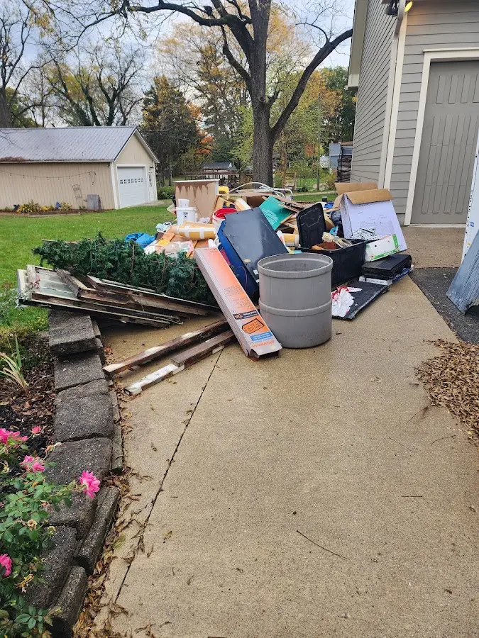 Dumpster being loaded with debris for Demolition Dumpster Rental in Myerstown
